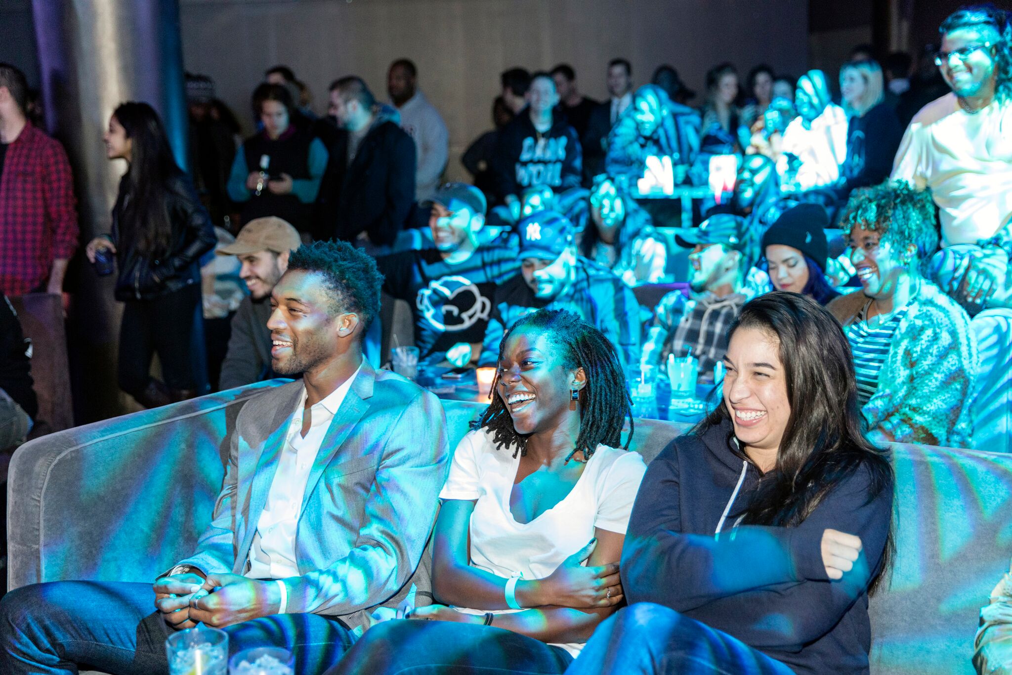 Audience members enjoying the Bodega Boys live podcast event